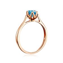 Золотое кольцо с голубым топазом swiss. Артикул 530110/топ
